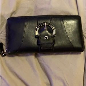 Black Coach wallet.  Blue lining, silver hardware.